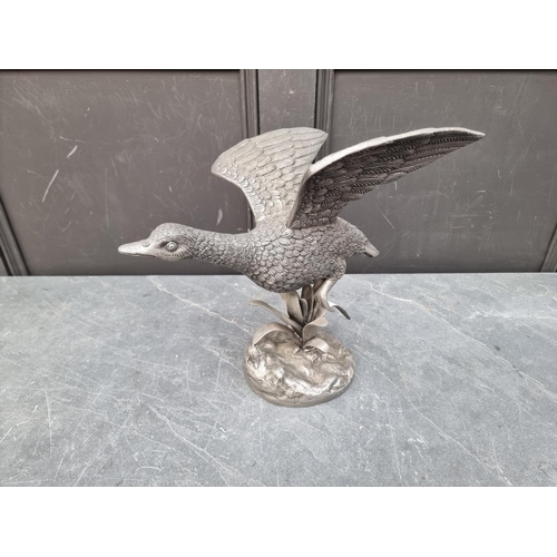 1275 - A pewter flying goose, 34cm high. 