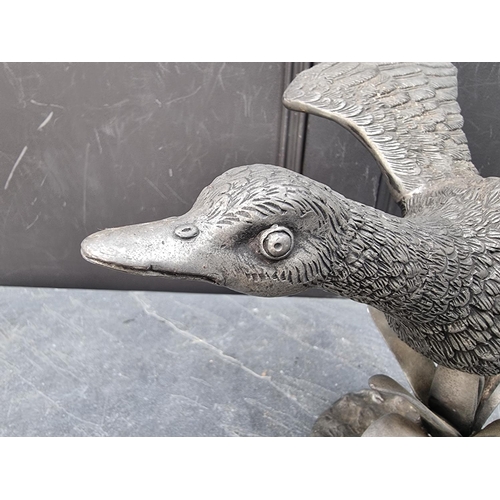 1275 - A pewter flying goose, 34cm high. 