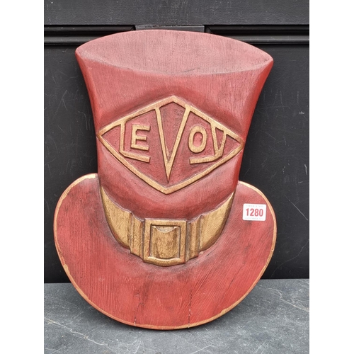 1280 - Advertising: a painted wood 'Levoy' hat sign, 41cm high.