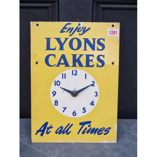 1281 - Advertising: a 1950s painted metal 'Lyons Cakes' wall clock, with Smiths Bakelite movement, 35.5 x 2... 