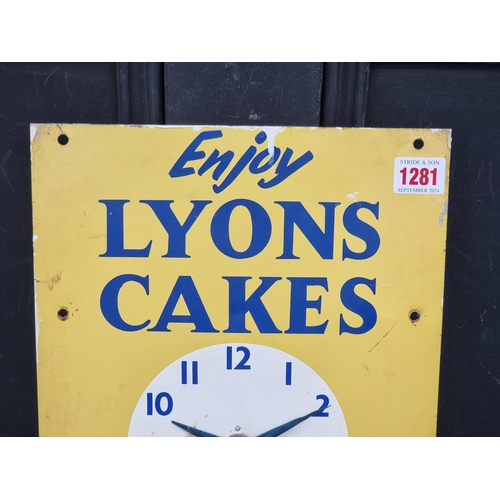 1281 - Advertising: a 1950s painted metal 'Lyons Cakes' wall clock, with Smiths Bakelite movement, 35.5 x 2... 