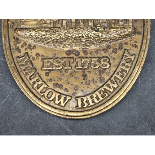 1293 - Advertising: a lacquered brass relief plaque, inscribed 'Thomas Wethered & Sons, Marlow Brewery'... 