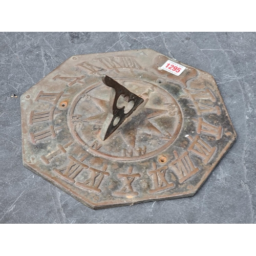 1295 - A copper octagonal sundial, 28cm wide. 