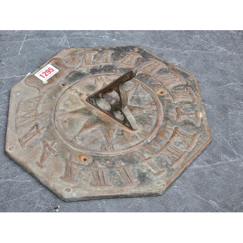 1295 - A copper octagonal sundial, 28cm wide. 