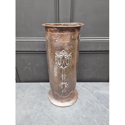 1317 - A good Art Nouveau hammered copper stick stand, indistinctly marked to base, 66cm high. ... 