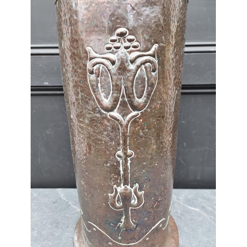 1317 - A good Art Nouveau hammered copper stick stand, indistinctly marked to base, 66cm high. ... 