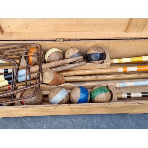 1322 - An antique croquet set, boxed.