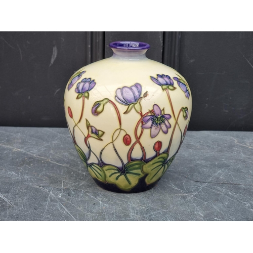 1324 - A Moorcroft 'Hepatica' pattern ovoid vase, 17.5cm high, (minor crazing).