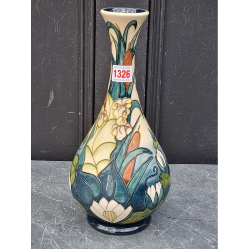 1326 - A Moorcroft 'Lamia' pattern baluster vase, 31cm high, (minor crazing). 