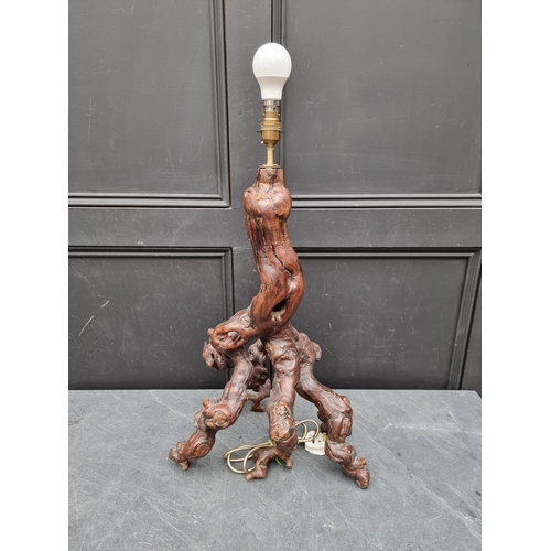 1335 - A large root wood table lamp, height excluding fitting 60cm. 