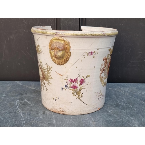 1336 - A 19th century French pottery armorial wine cooler, 29.5cm high x 32cm diameter, (a.f.).... 