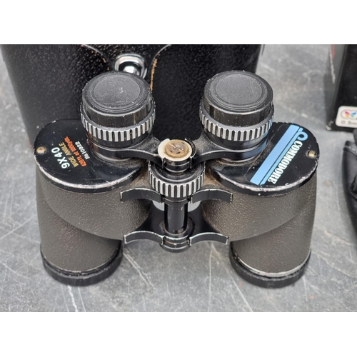 1340 - Three cased pairs of binoculars, to include a pair of Carl Zeiss 'Jenoptem 8x30W examples.... 