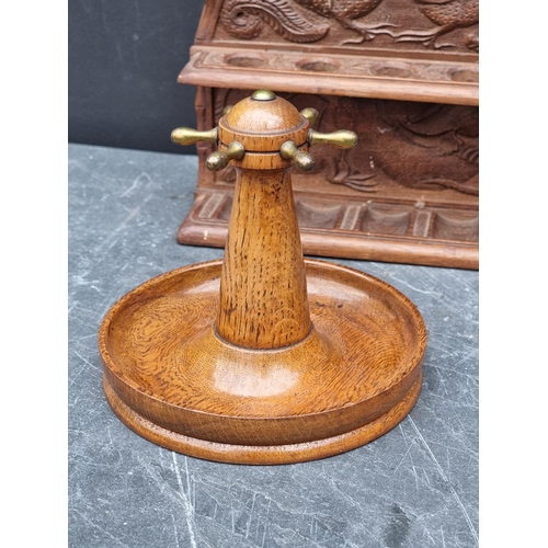 1342 - Tobacciana: a group of smoking related items, to include an oak novelty capstan pipe stand. (5)... 