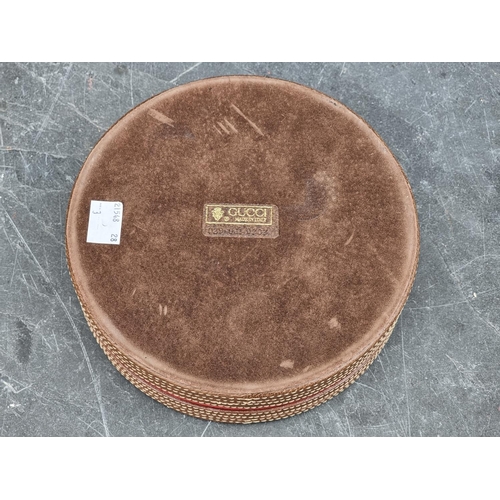 1352 - A Gucci leather ashtray, 18cm diameter. 