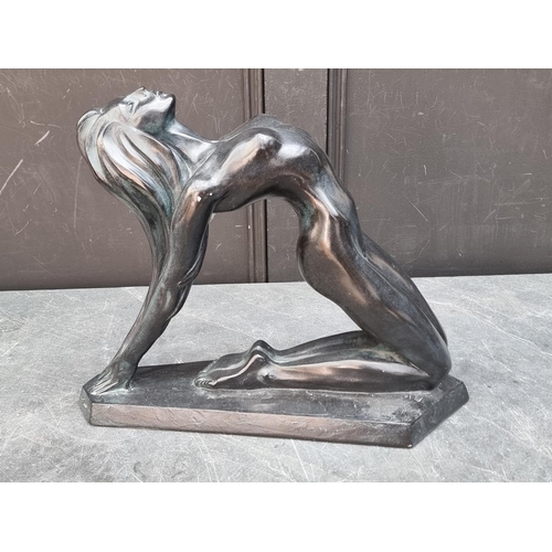 1366 - After Alexander Danel, a pottery sculpture of a kneeling nude, by Austin Reproductions, 46cm wide.... 