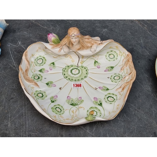 1368 - A Continental porcelain centrepiece, 33cm wide; together with a French porcelain wall pocket, 31.5cm... 