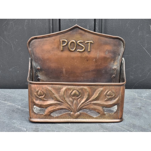 1371 - An Art Nouveau repousse copper 'Post' box, 23.5cm wide.