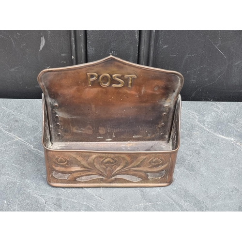 1371 - An Art Nouveau repousse copper 'Post' box, 23.5cm wide.