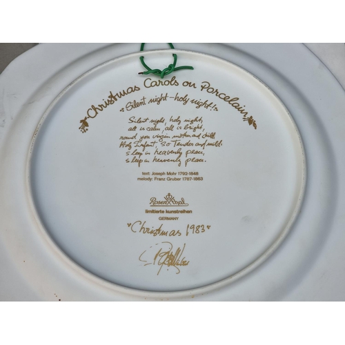 1375 - A Rosenthal Christmas 1983 plate, by Bjorn Wiinblad, boxed; together with another Rosenthal cup... 