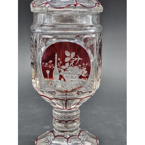 1379 - A good 19th century Bohemian ruby flashed and cut glass goblet & cover, 29.5cm high; together wi... 