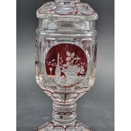 1379 - A good 19th century Bohemian ruby flashed and cut glass goblet & cover, 29.5cm high; together wi... 