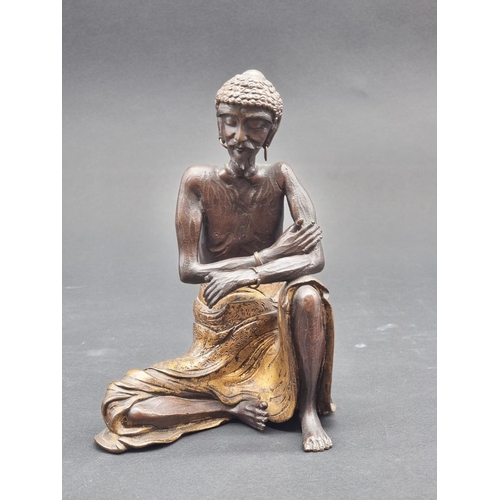 1381 - A Chinese bronze and parcel gilt figure of The Ascetic Sakyamuni, signed to base, 22cm high. &n... 