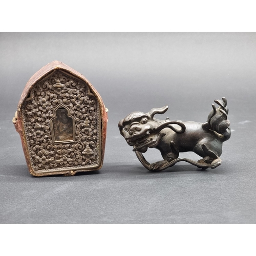 1385 - A small Chinese bronze lion dog, 8cm high; together with a small 19th century Tibetan Gau prayer box... 