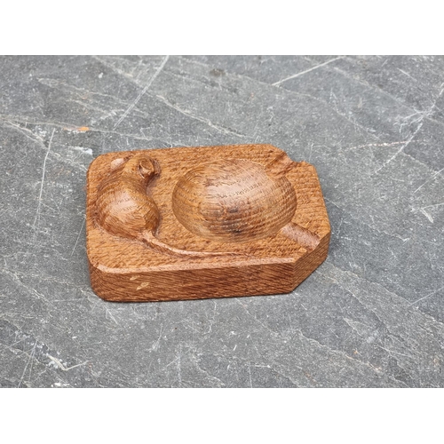 1391 - A Robert 'Mouseman' Thompson oak ashtray, 10cm wide.