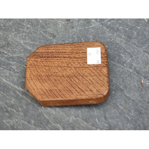 1391 - A Robert 'Mouseman' Thompson oak ashtray, 10cm wide.