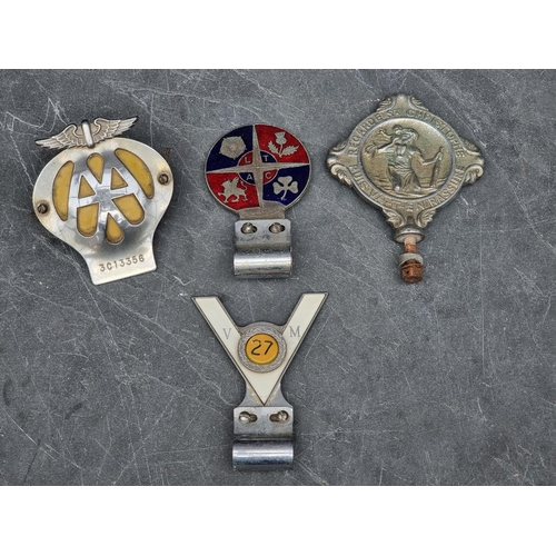 1401 - Automobilia: four vintage car radiator badges.