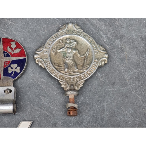 1401 - Automobilia: four vintage car radiator badges.