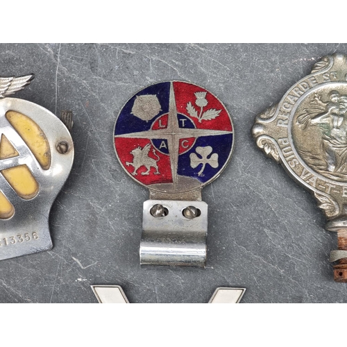 1401 - Automobilia: four vintage car radiator badges.