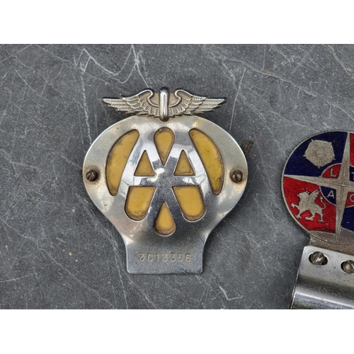 1401 - Automobilia: four vintage car radiator badges.