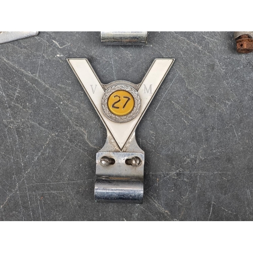 1401 - Automobilia: four vintage car radiator badges.