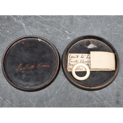 1403 - Three early 19th century Stobwasser style circular boxes and covers, one inscribed 'La Belle Frasc',... 