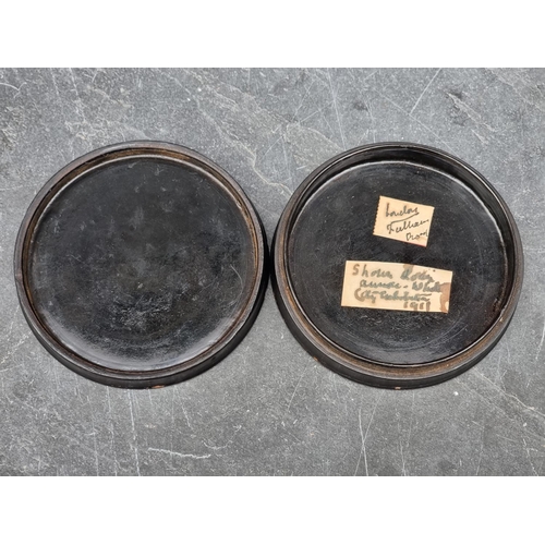 1403 - Three early 19th century Stobwasser style circular boxes and covers, one inscribed 'La Belle Frasc',... 