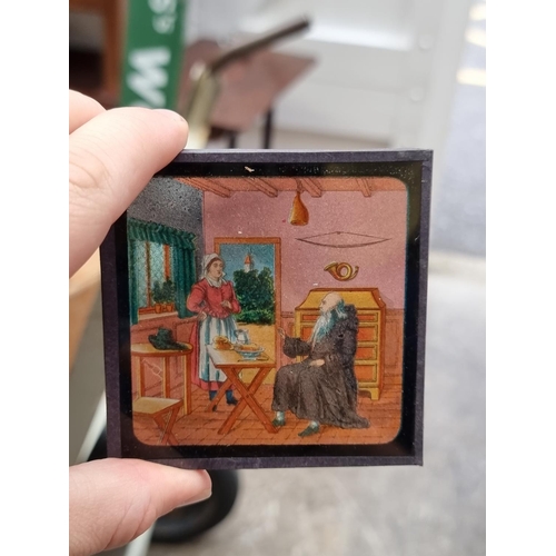 1406 - A small collection of magic lantern slides.