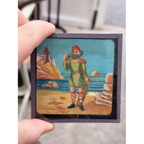 1406 - A small collection of magic lantern slides.