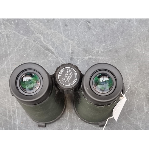 1409 - A pair of Hawke Nature-Trek 12x50 binoculars. 