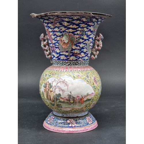 1411 - A Chinese Canton enamel twin handled vase and stand, 18th century, 28cm high, (a.f.).... 