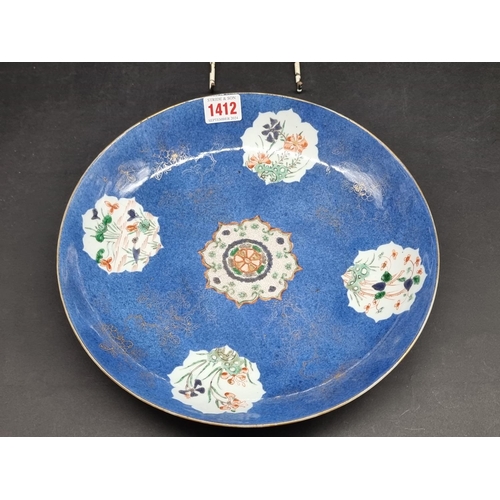 1412 - A Chinese famille vert and powder blue saucer dish, Kangxi, 28cm diameter.