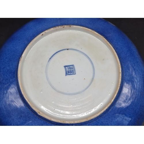 1412 - A Chinese famille vert and powder blue saucer dish, Kangxi, 28cm diameter.