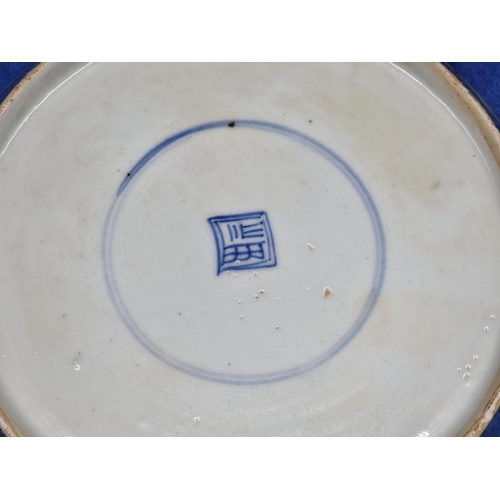 1412 - A Chinese famille vert and powder blue saucer dish, Kangxi, 28cm diameter.