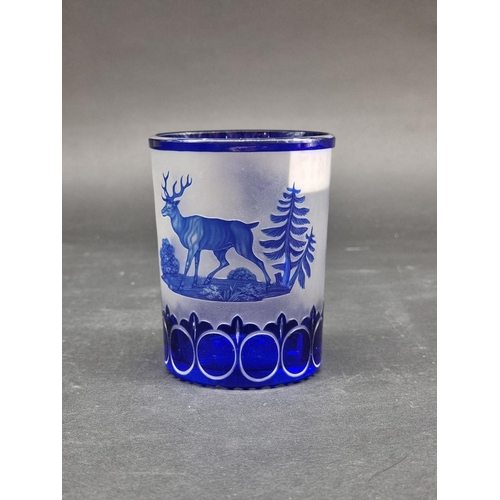 1417 - A 19th century Bohemian cameo glass beaker, decorated with a stag and a horse, 11cm high.... 