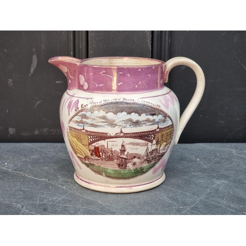 1423 - A Victorian Sunderland lustre 'Crimea' jug, 14.5cm high.