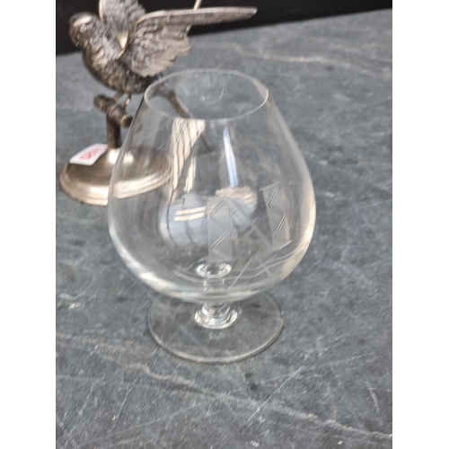 1425 - An unusual electroplated novelty budgerigar brandy glass warmer, height excluding glass 13.5cm.... 