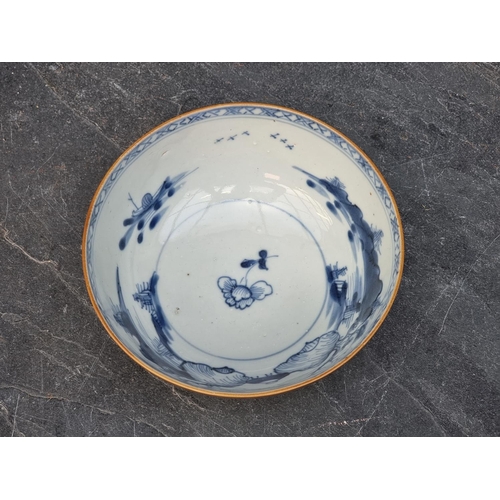 1434 - A Chinese Nanking Cargo bowl, 15cm diameter; together with another Chinese blue glazed dish, relief ... 