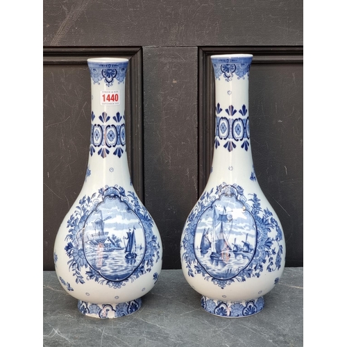 1440 - A large pair of Dutch Delft baluster vases, 38.5cm high, (chips to foot rim of one). (2)... 