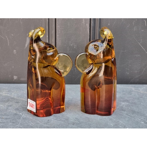 1441 - A pair of Murano amethyst glass elephant bookends, labelled 'Archimede Seguso', 18.5cm high. (2)... 