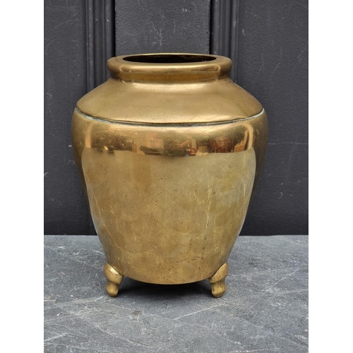 1463 - A Chinese polished bronze tripod vase, Xuande six character mark to base, 20cm high.... 